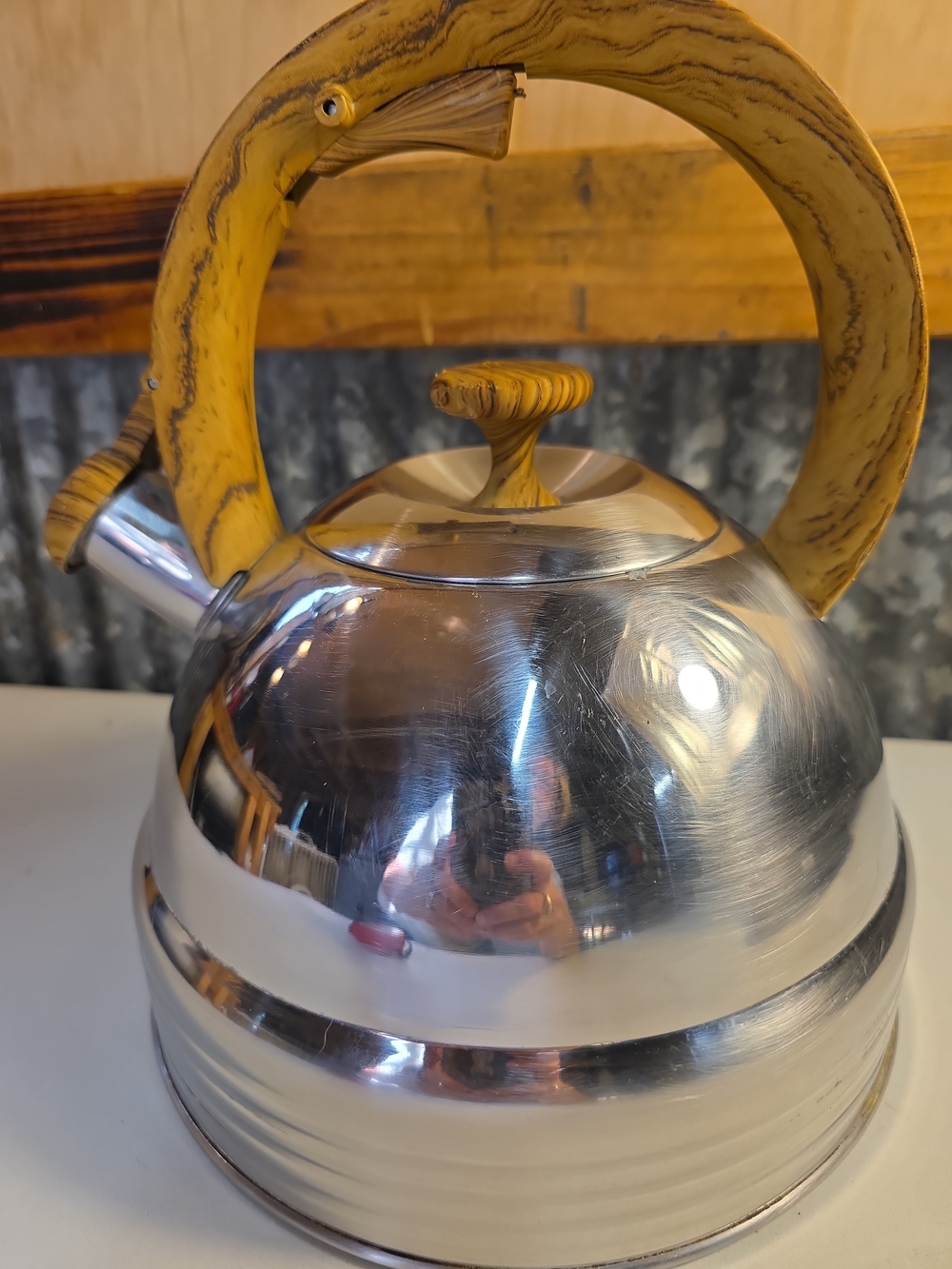 Stainless Steel Whistling Kettle with Yellow Wood-Effect Handle